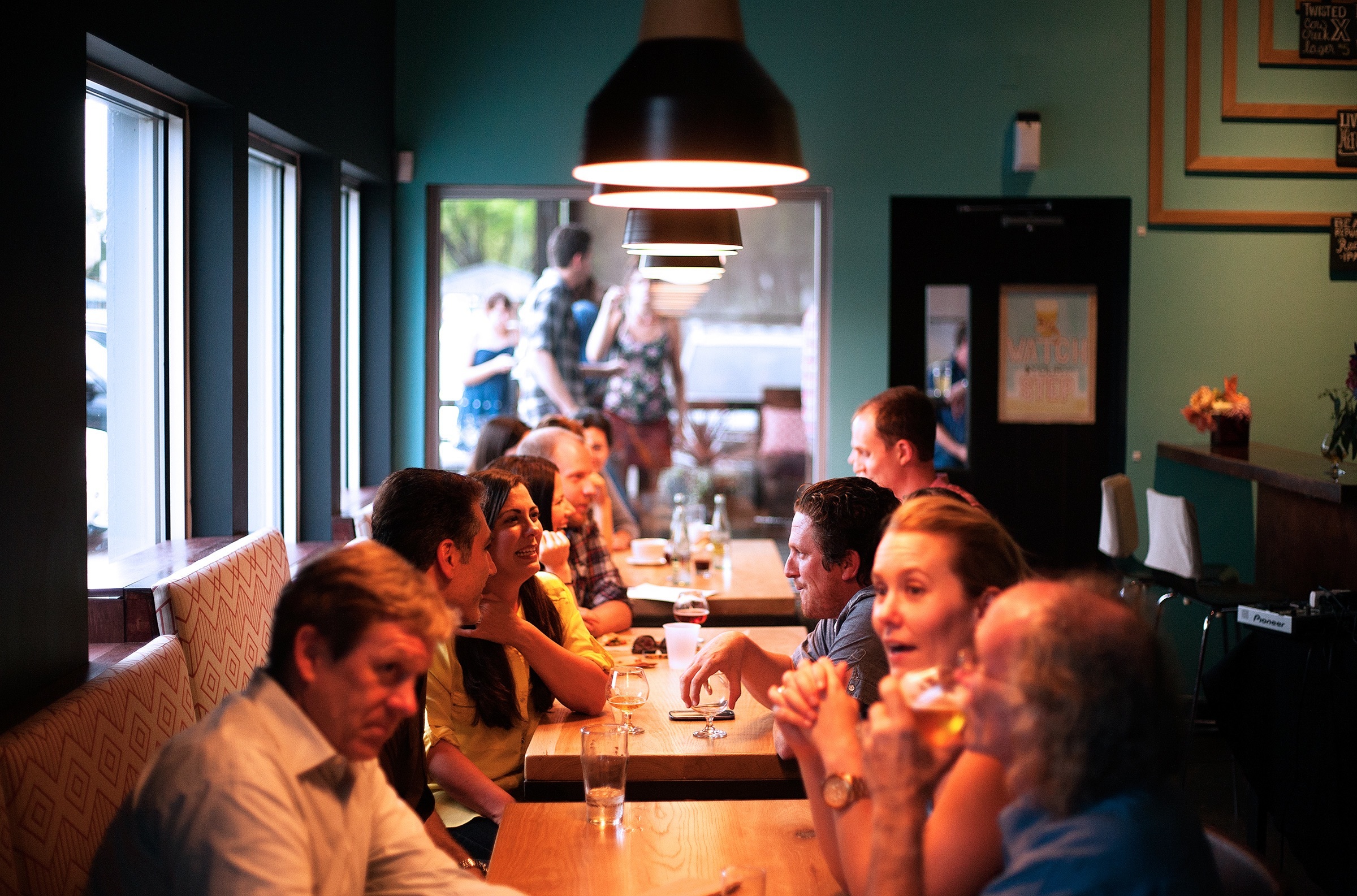 lively patrons seated at restaurant tables