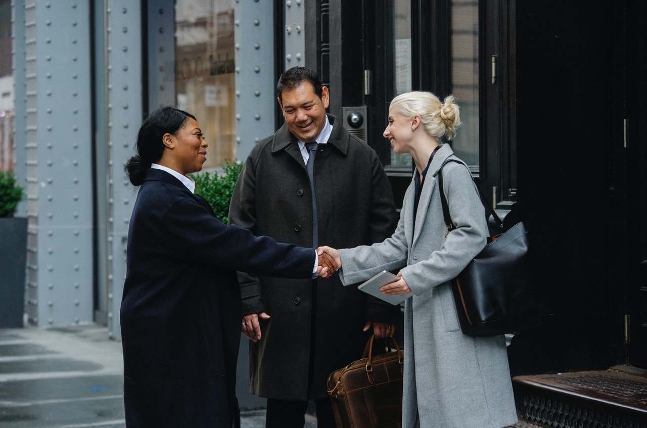 post pandemic handshake between business colleagues